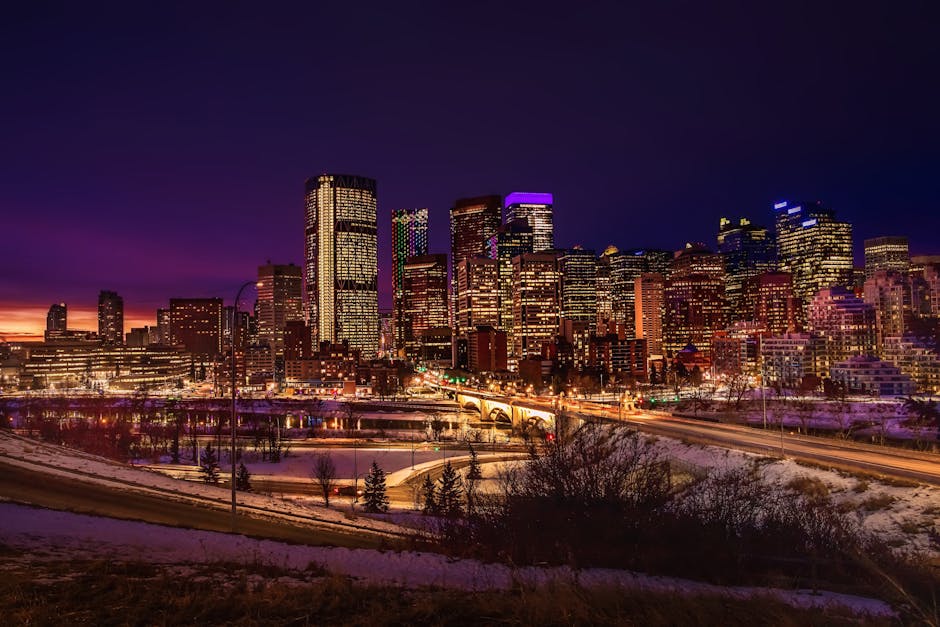 Calgary illuminated skyline at dusk — same day loans Alberta