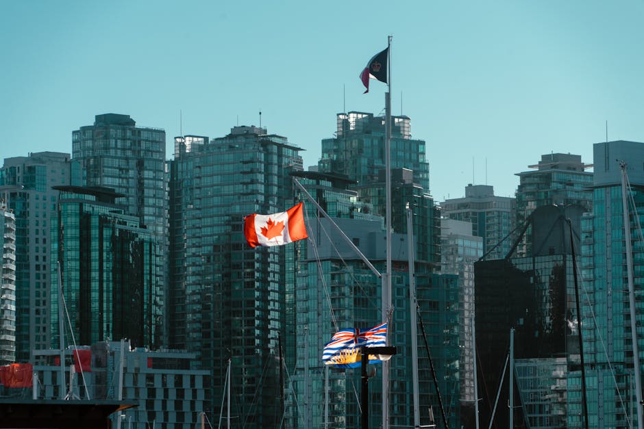Vancouver with Canadian flag —  same day cash loans available Canada-wide