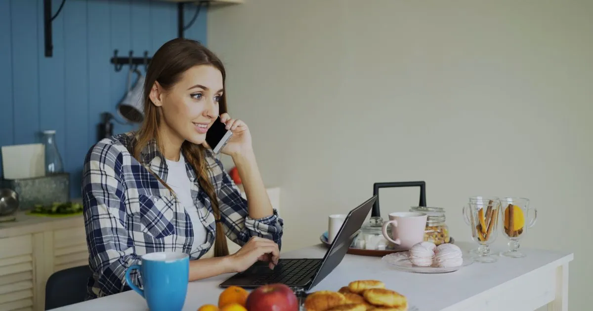 Applying for home repair loans by phone from the kitchen
