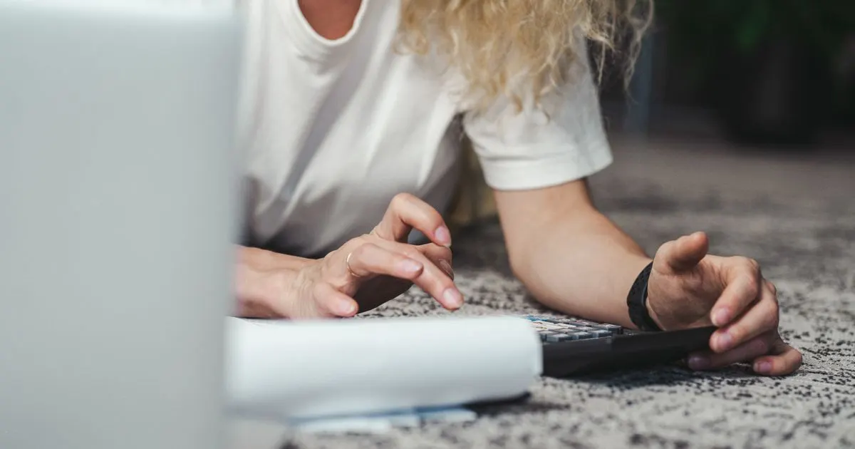 Working out the cost of moving expense loans with a calculator