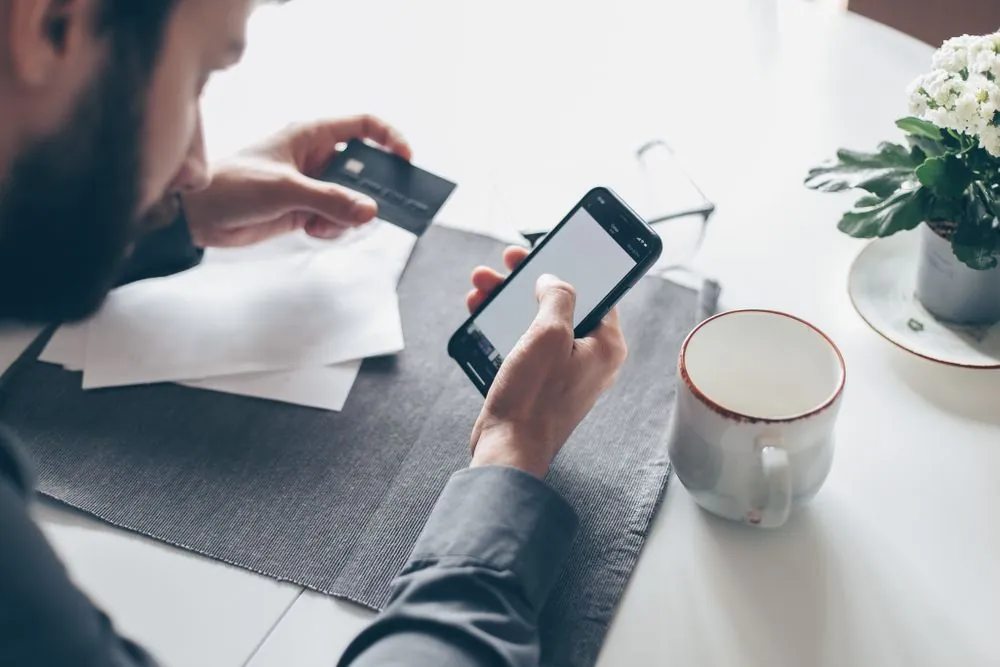 Applying for a same day e-transfer loan on a smartphone