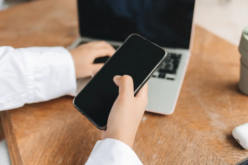 Setting up the Nyble app with a phone and laptop
